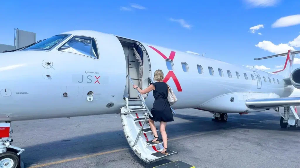 woman boarding airplane