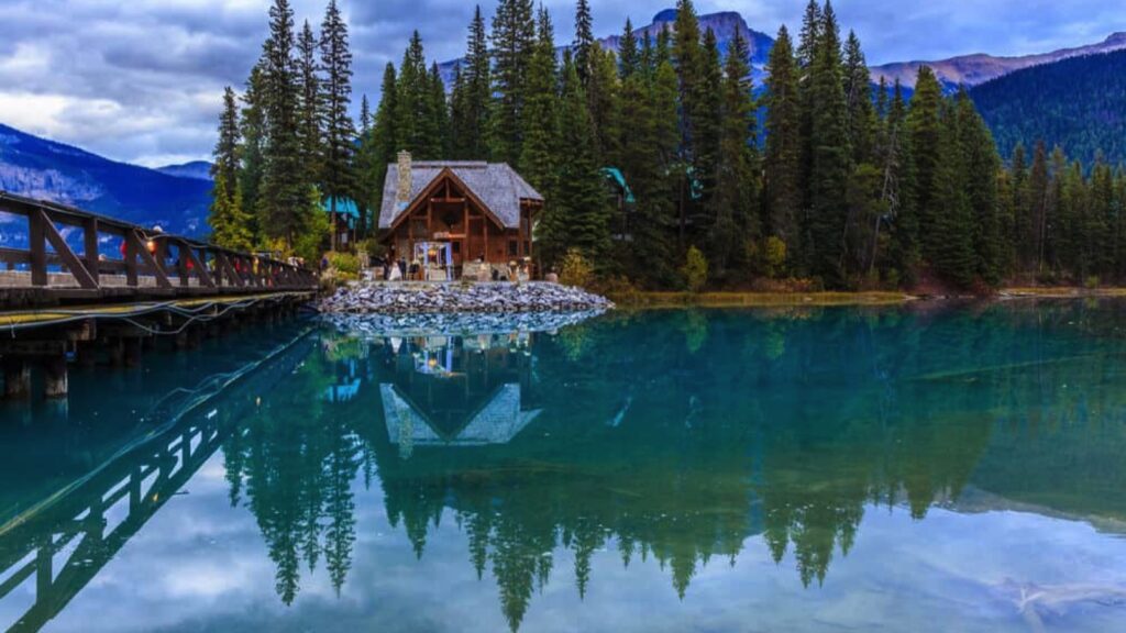 house on lake with bridge