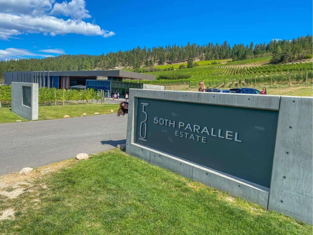 50th parallel entrance sign