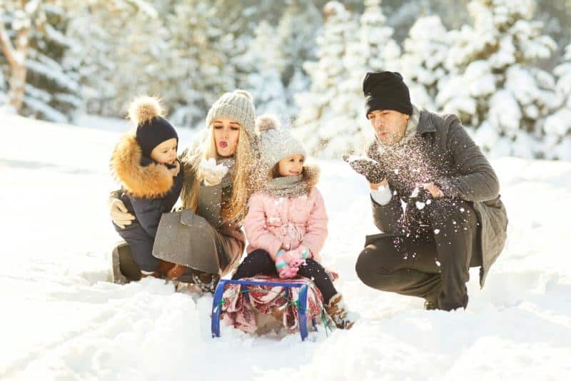 family in snow
