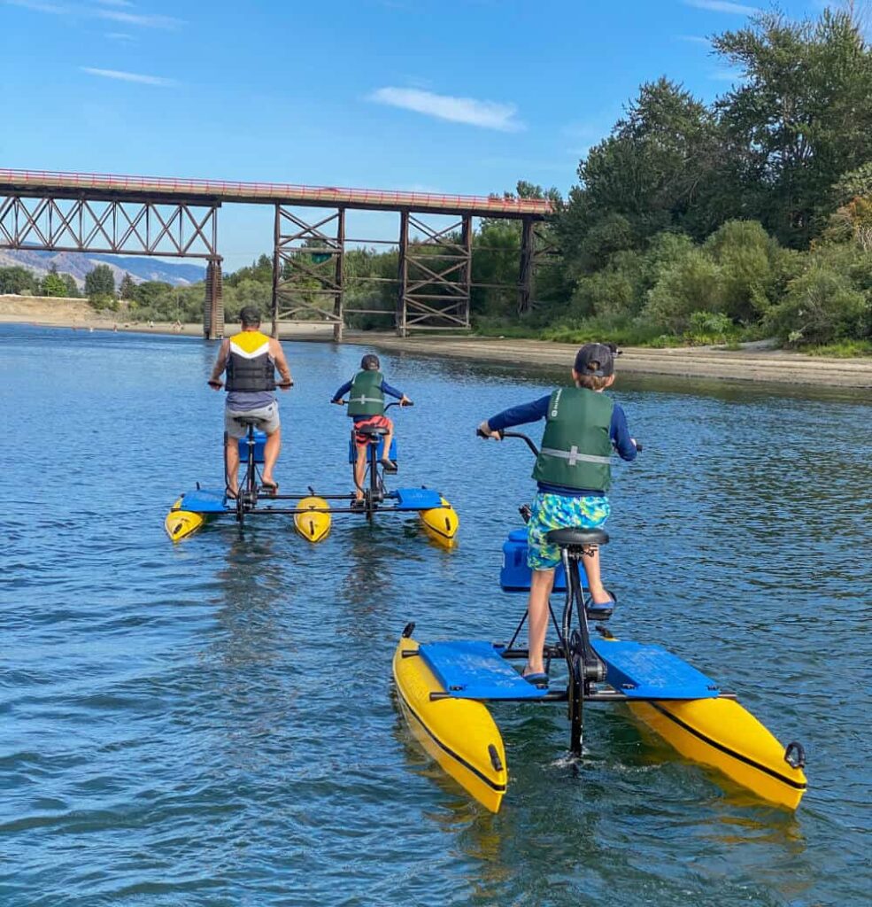 family on water bikes in kamloops