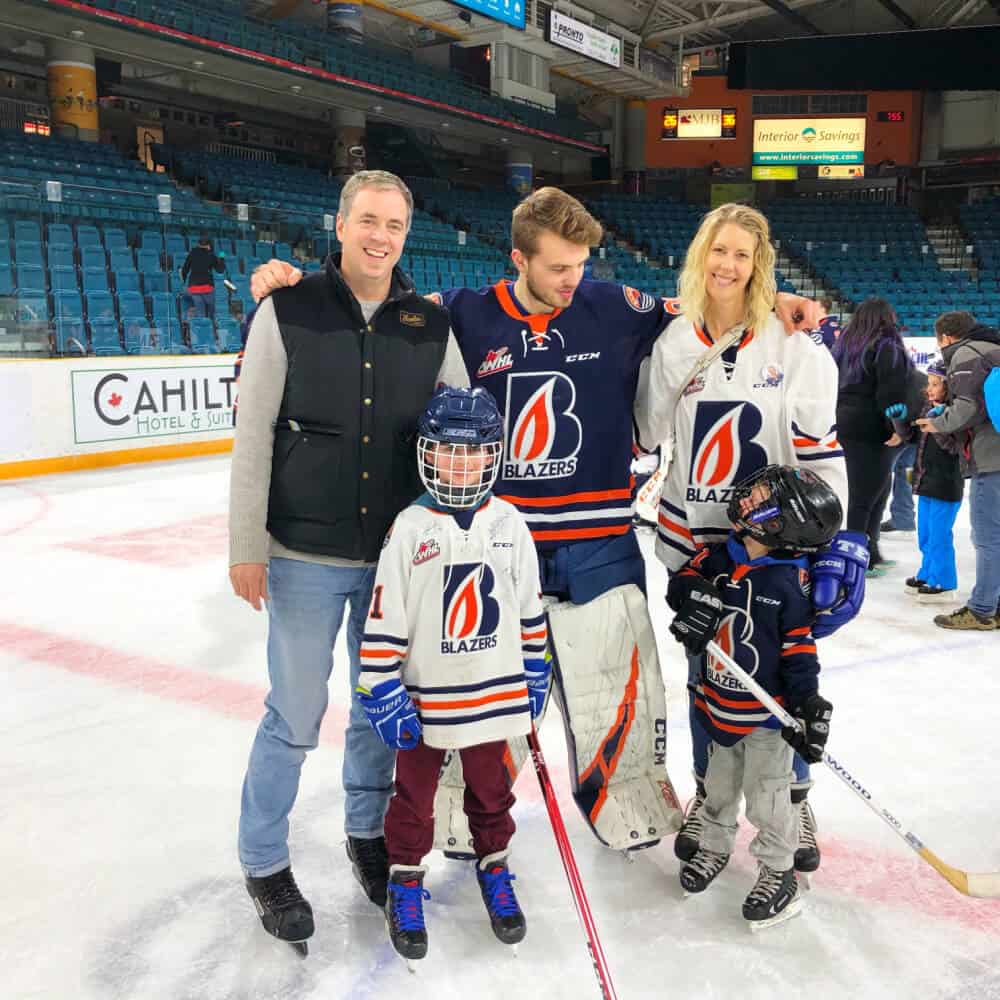 family with hockey goalie