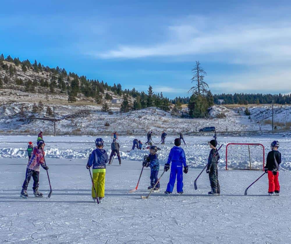 kids skating on outdoor pond