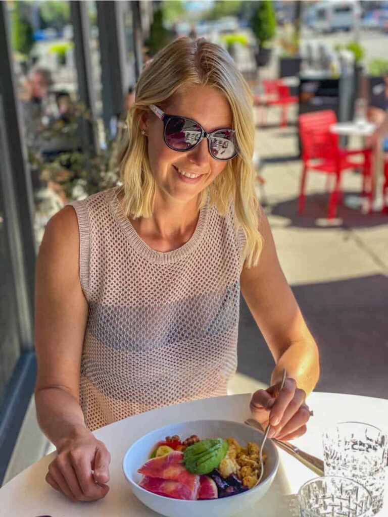 woman eating on patio in kamloops